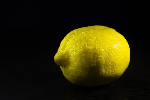 Fruit lemon on black background Stock Photos