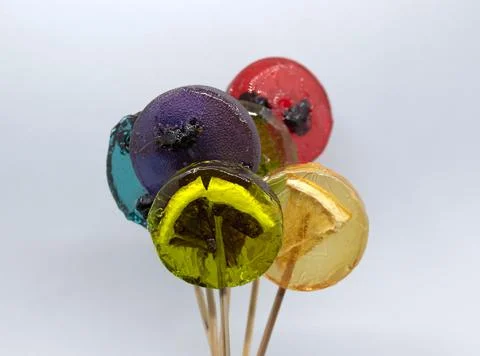 Fruit lollipops close up 3 Stock Photos