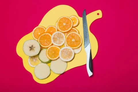 Fruit lying on a cutting board Stock Photos