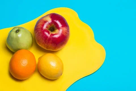 Fruit lying on a cutting board Stock Photos