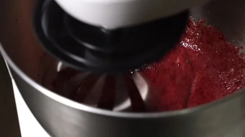 Fruit mousse is whipped in a mixer Stock Footage 236486983