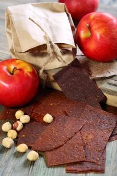 Fruit paste and nuts. Stock Photos