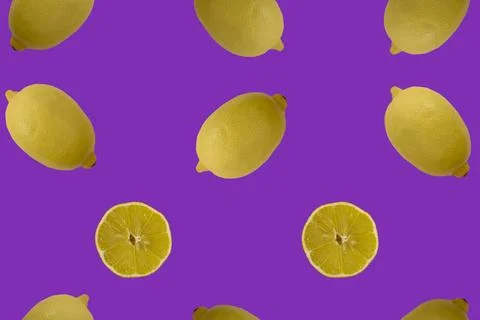 Fruit pattern. Colorful pattern of lemon slices on a purple background. Pho.. Foto stock