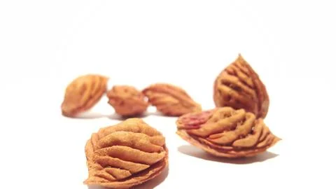 Fruit Pits on White Background Stock Photos