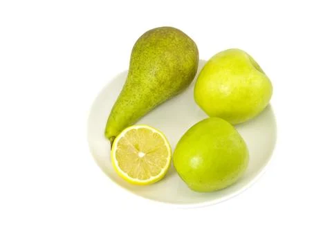 Fruit in plate Stock Photos