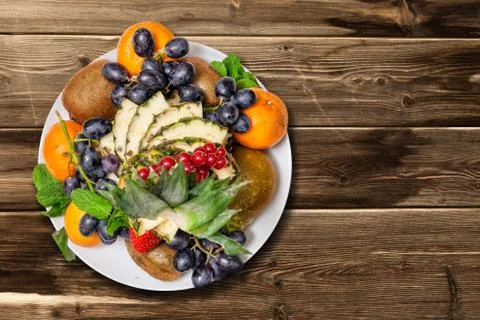 Fruit plate on the table Stock Photos