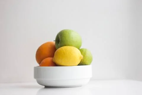 Fruit in a plate on a white background 스톡 사진