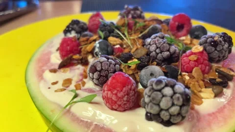Fruit platter interesting fruit sandwich with granules yogurt cream on Stock Footage 294419928