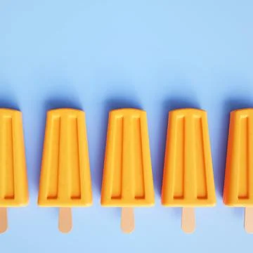Fruit popsicles on a stick on blue background Stock Illustration