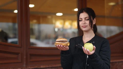 Fruit preference, Wellness decision, Apple selection Stock-Footage 248954285