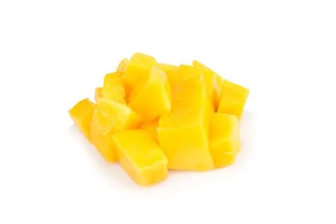 Fruit pulp cube piece mango fall isolated on white background Stock Photos