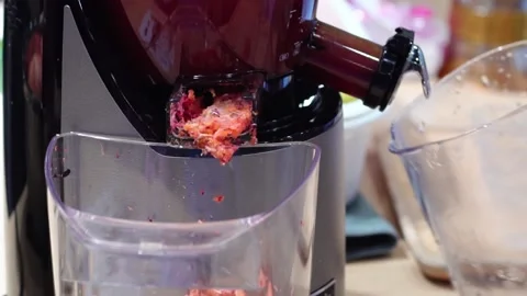 The fruit pulp extractor is working. Stock Footage 219699156