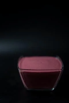 Fruit puree on a black background Stock Photos