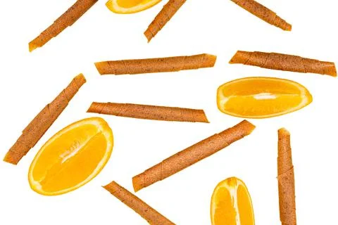 Fruit roll up with orange top view, isolated on white. Pattern of fruit pasti Stock Photos