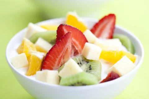 Fruit salad with chunks of fruit and yogurt Stock Photos