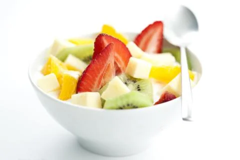 Fruit salad with chunks of fruit and yogurt Stock Photos