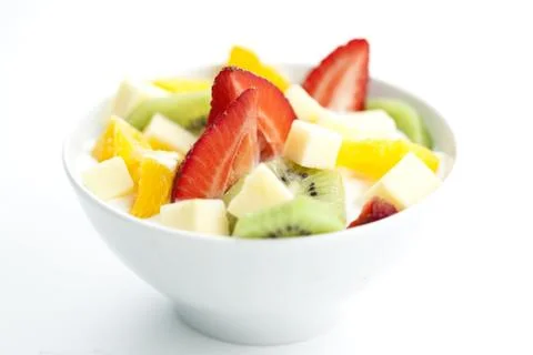 Fruit salad with chunks of fruit and yogurt Stock Photos