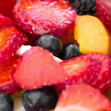 Fruit salad closeup Stock Photos