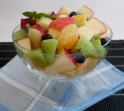 Fruit salad on a dark background Stock Photos