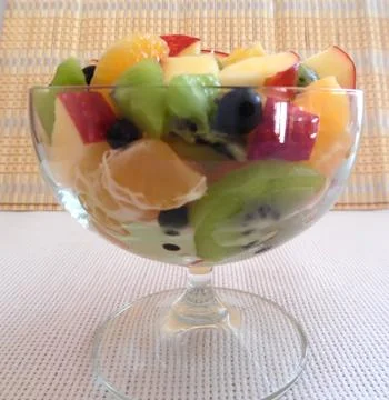Fruit salad on a light background Stock Photos