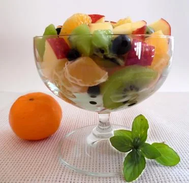 Fruit salad on a light background Stock Photos