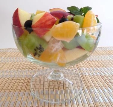 Fruit salad on a light background Stock Photos