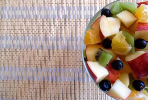 Fruit salad on a light background Stock Photos