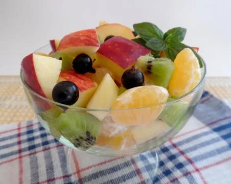 Fruit salad on a light background Foto stock