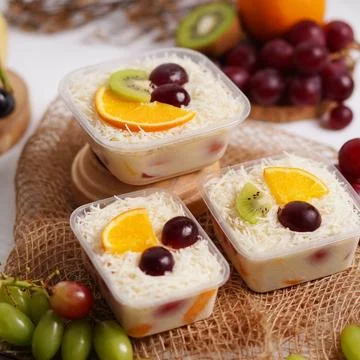 Fruit salad in plastic containers Stock Photos