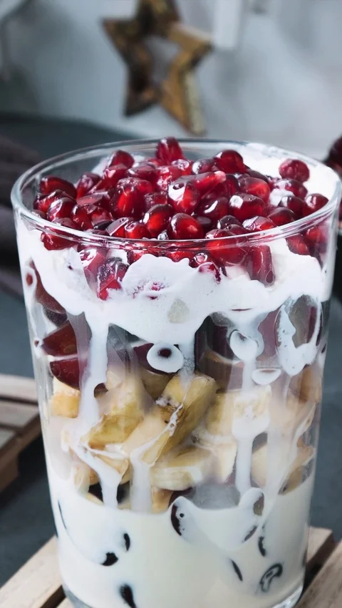 FRUIT SALAD in a transparent glass. Stock Footage 121878448