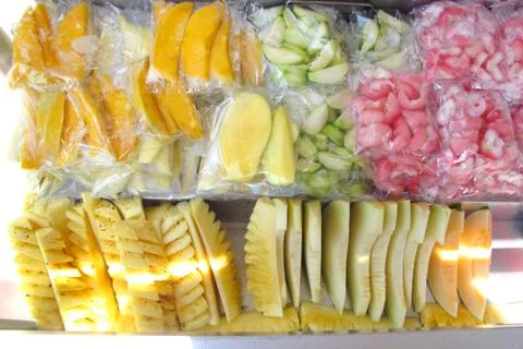 Fruit slice cut in piece in plastic bag pack on tray for sell at Penang Malay Stock Photos