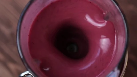 Fruit smoothie in a blender Stock Footage 73920419