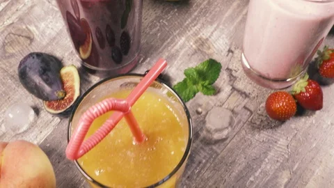 Fruit smoothies on the table near the fruit top view Stock-Footage 93281014