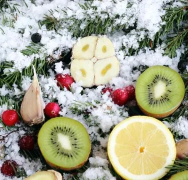 Fruit on snow Stock Photos