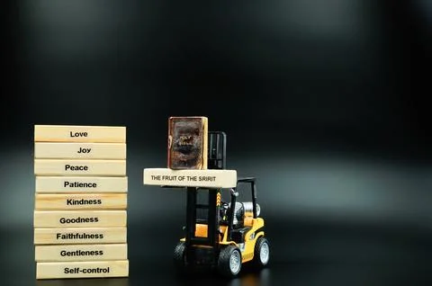 The Fruit Of The Spirit Stack Block Forklift lifting Up Block 스톡 사진