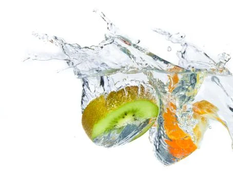 Fruit splashing Stock Photos
