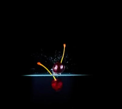 Fruit Splashing into water. Stock Photos