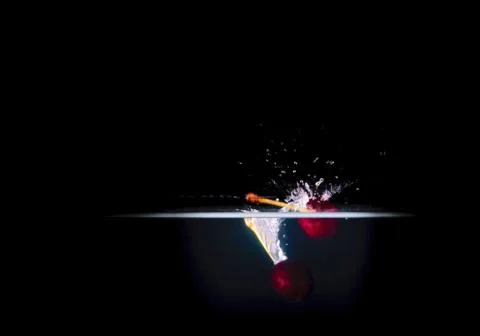 Fruit Splashing into water. Stock Photos