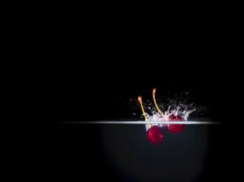 Fruit Splashing into water. Stock Photos