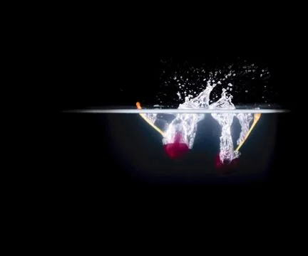 Fruit Splashing into water. Stock Photos