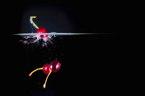 Fruit Splashing into water. Stock Photos
