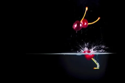 Fruit Splashing into water. Stock Photos