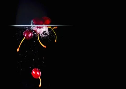 Fruit Splashing into water. Stock Photos