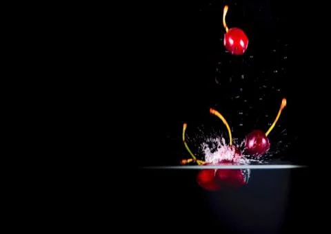 Fruit Splashing into water. Stock Photos