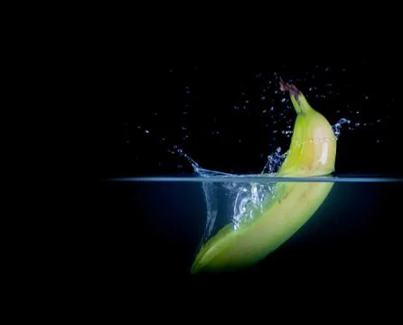 Fruit Splashing into water. Stock Photos