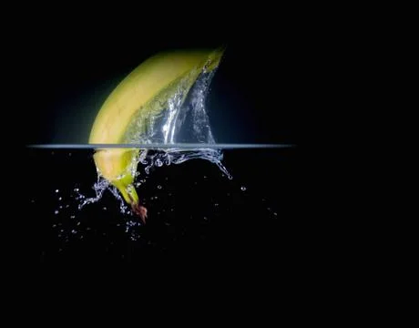 Fruit Splashing into water. Stock Photos
