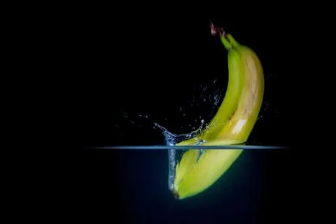 Fruit Splashing into water. Stock Photos