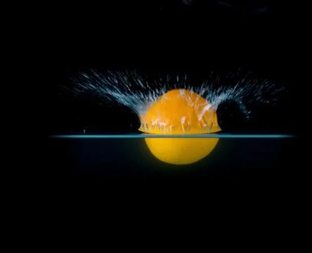 Fruit Splashing into water. Stock Photos