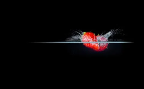 Fruit Splashing into water. Stock Photos