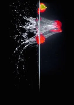 Fruit Splashing into water. Stock Photos